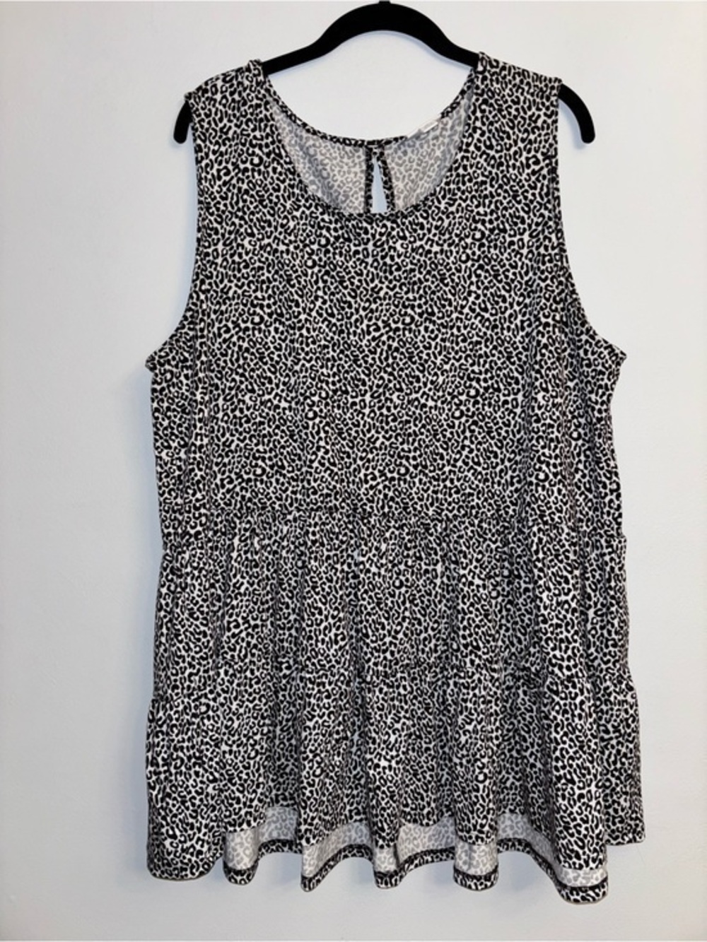 LuLaRoe Black and White Leopard Print Sleeveless Peplum Top